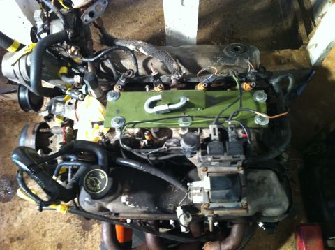 1992 Ford Bronco - This is a close-up view of a vehicle engine, showing various components and wiring.