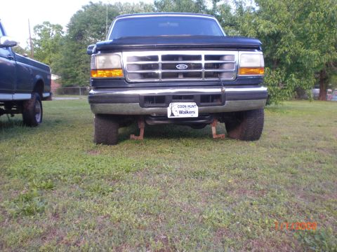 1993 Ford Bronco - Front View, the things hanging under the front are the swaybar mounts that I had to cut and extend.