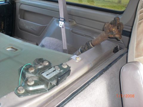 1993 Ford Bronco - Interior view shows a driveshaft and mounting bracket. The year is not discernible.