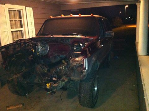 1996 Ford Bronco - This 1996 Ford Bronco is missing its front clip and appears to be undergoing repairs or disassembly.