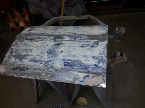1967 Ford F-100 - This truck door is undergoing bodywork, stripped down to bare metal and coated in primer.