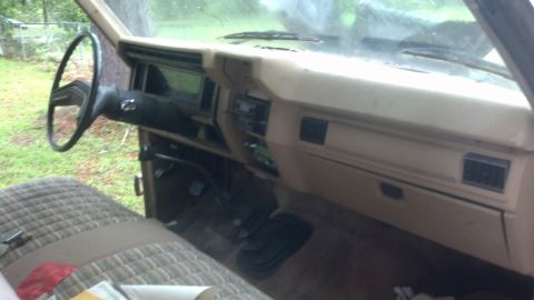 1983 Ford F-250 - Interior view of a truck, showing the dashboard, steering wheel, and seating area.