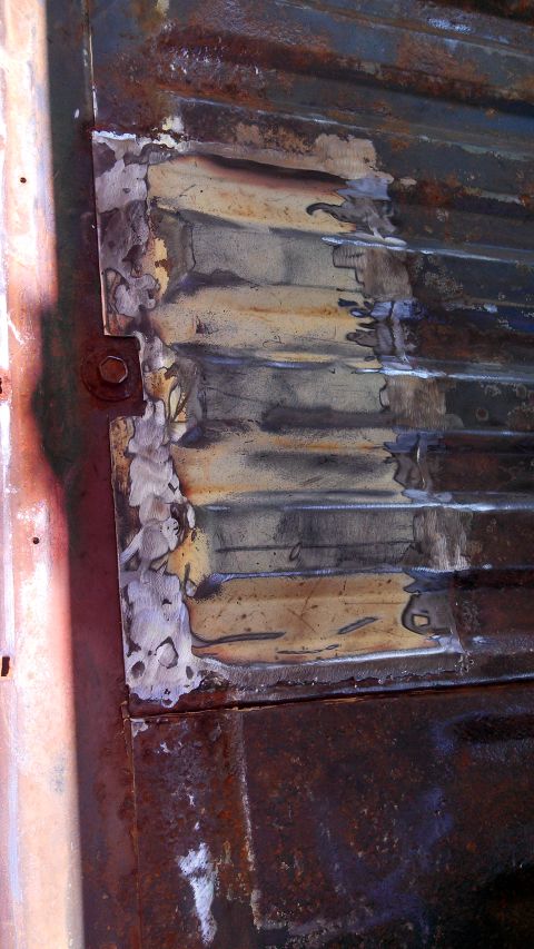 1979 Ford Bronco - This close-up shows a section of a vehicle's body that has been repaired with welding.