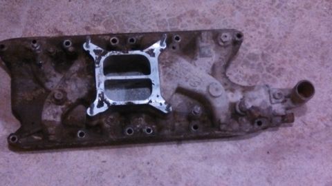 1979 Ford Bronco - This is an intake manifold, likely for a V8 engine, shown from above.