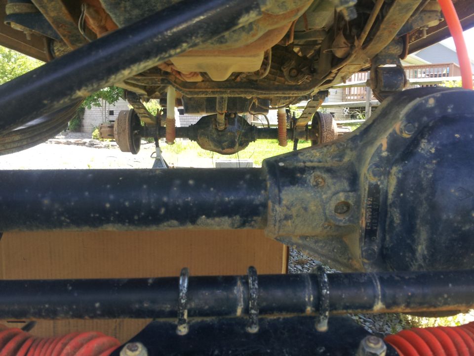 Underside view of rear axle and suspension components