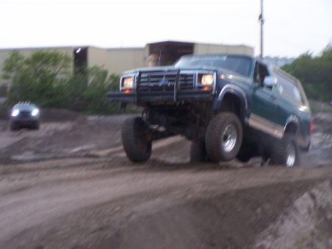 1996 Ford Bronco - Trucks on the Track 5/11/13 I have VERY soft suspension. Reason the passenger side axle is lower is cause its shock tower ripped off