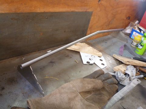 1964 Mercury Monterey - Metal fabrication parts and tools are laid out on a workbench.