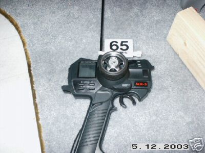 1998 Mercury Sable - An RC remote control is shown, with a label indicating '65 MHz'.