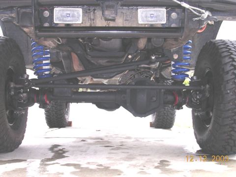 1994 Ford Bronco - the whole front done. the spirngs are bowed in a little now, that could have been solved by putting the mounting bolts a little outward. if…