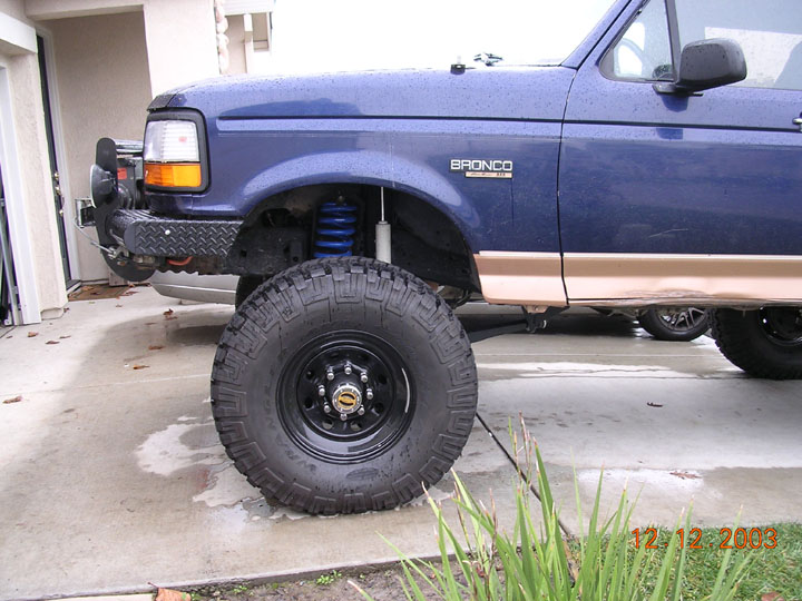 the new lower mounts raised the front a bit, and i definately have enuf room for the 37's and 40's should only require a little trimming.  It actually sits fairly level now, but i think I will still do a rear shackle flip.
