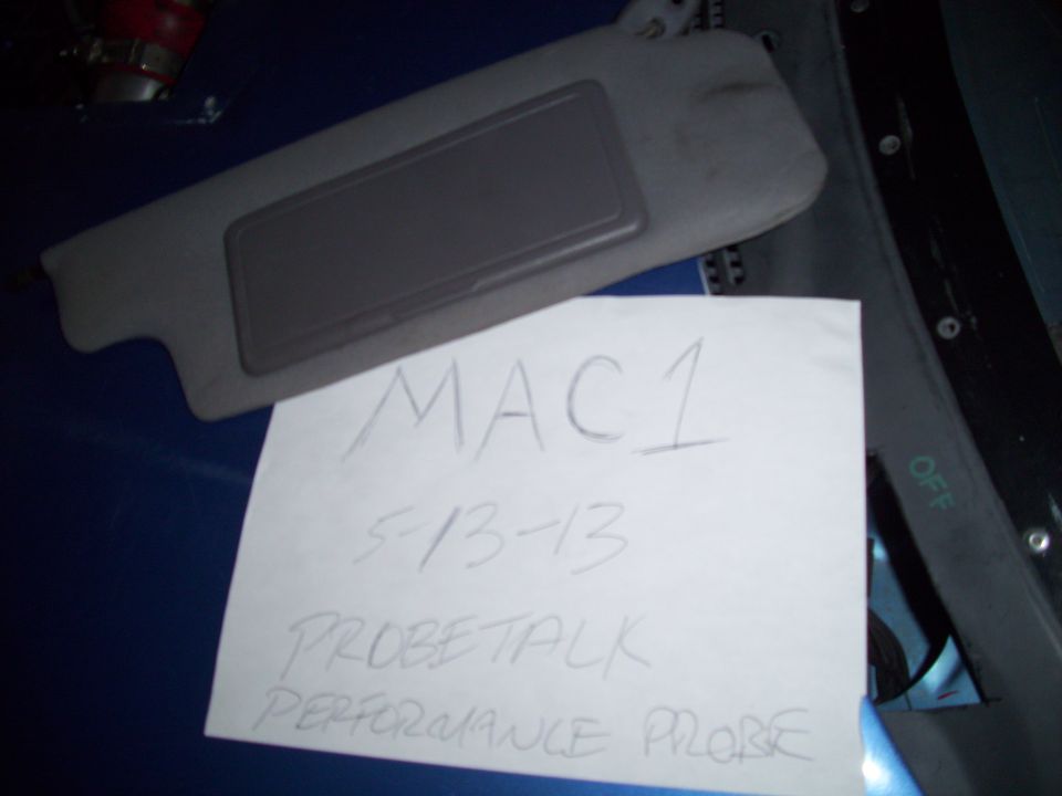 Car sun visor with a paper note that says MAC1, 5-13-13, PROBETALK, PERFORMANCE PRO