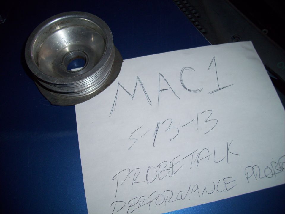 Pulley next to paper reading 'MAC1 5-13-13 PROBETALK PERFORMANCE PROBE'