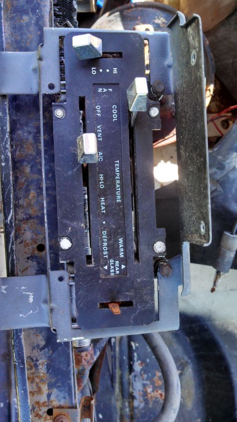 1979 Ford Bronco - HVAC control panel showing fan speed, temperature, and air direction settings.