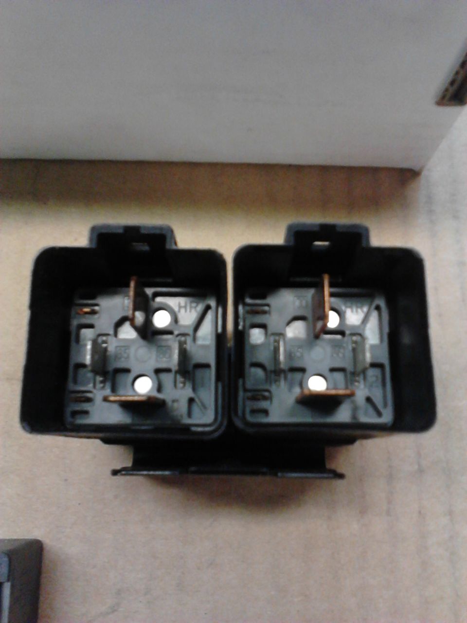 70 amp SD relays from Chrysler auto, uses a clip that mounts both at one time. I used a pair of these as the relays for my Windstar dual electric cooling fans. I used these higher amperage relays instead of the 30 amp relays used on the Derale #16749 adjustable fan controllers. The Derale is actually just used as a trigger for the fans, these relays do all the carrying of heavy electrical load the fans require.