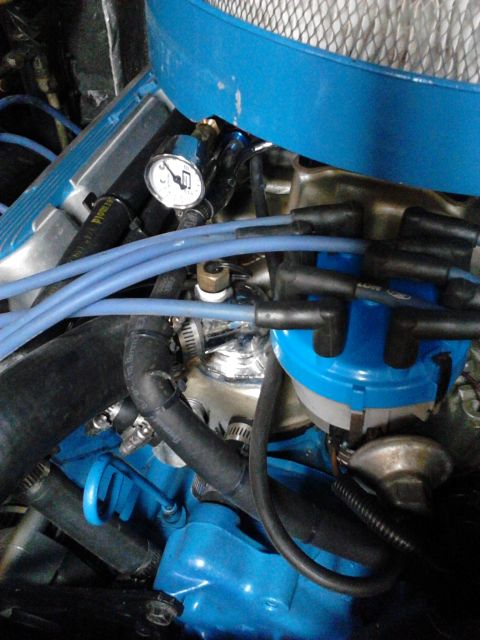 1979 Ford Ranchero - Pic shows where the low temp sensor for the Derale fan controller is located(brass fitting on water neck).