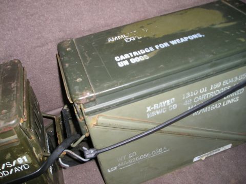 1996 Ford Bronco - Two green ammo cans are shown, one with the label 'CARTRIDGE FOR WEAPONS' and 'UN 0006'.