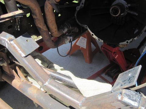 1989 Ford Bronco - Close-up view of engine components and fabricated frame parts, suggesting a custom build or repair.