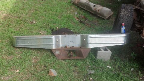1983 Ford F-250 - Chrome rear bumper with trailer hitch receiver, likely from a truck.