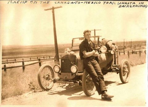 1909 Ford Model T - A man poses with his automobile on the Canada-to-Mexico Trail, with Shasta in the background.