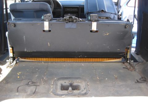 1988 Ford Bronco - Interior view of a 1988 Ford Bronco, focusing on the rear seat and floor area.