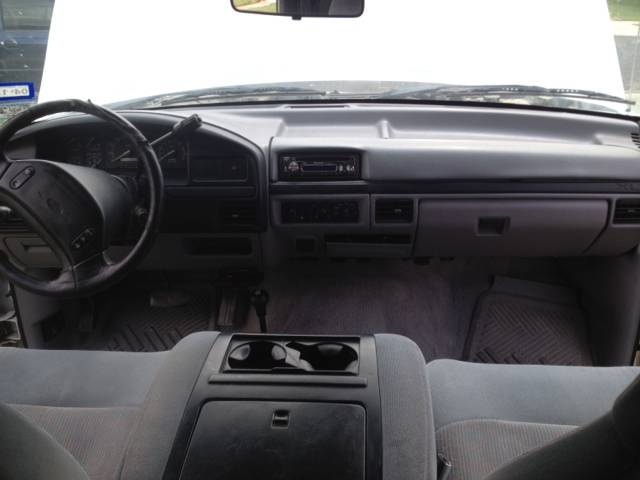 1997 Ford F-350 interior with gray seats and dashboard