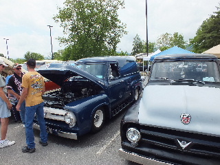 2013 Ford F-100 - Custom Ford panel van at a car show, with another truck beside it.