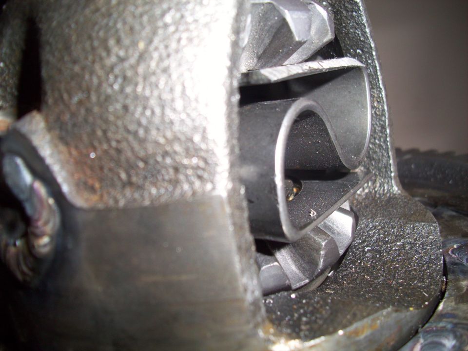 Turbocharger impeller with curved blades inside a housing