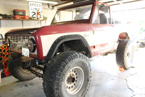 1968 Ford Bronco - This 1968 Ford Bronco is shown in a garage with a speed limit sign in the background.