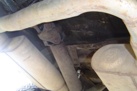 1993 Ford Bronco - Underside view shows exhaust system and driveshaft, no specific year identified.
