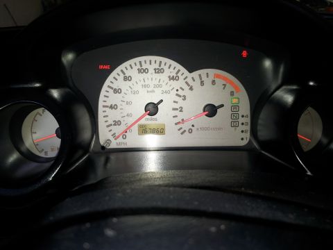 2001 Mitsubishi Eclipse - Dashboard gauges for a 2001 Mitsubishi Eclipse, showing 167,860 miles on the odometer.