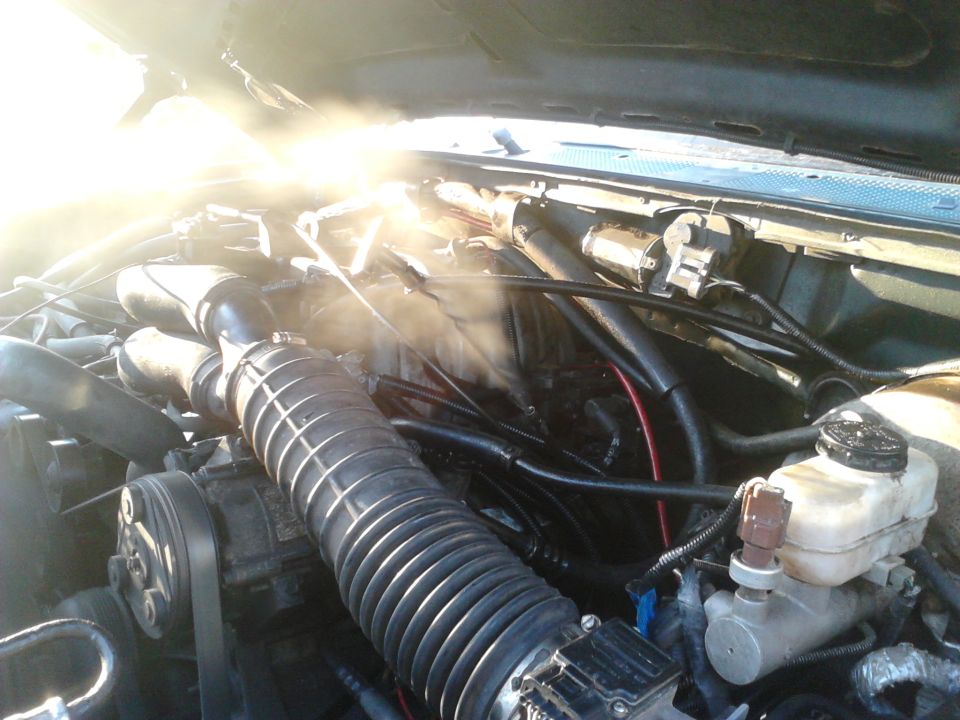 5/22/13

I have such bad blowby on this engine that the combustion gasses are blowing through the dipstick tube and the PCV system. I already rerouted the PCV to blow out under the truck cause it flooded the intake with gunk. this is my dipstick tube halfway pulled and the engine at idle. should see it when its revved up
