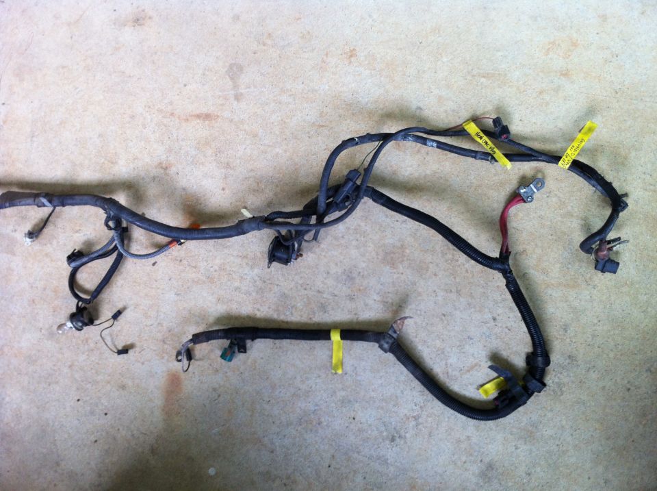 Automotive wiring harness with yellow identification tags and connectors