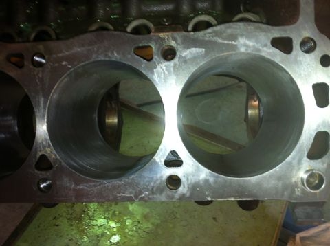 1992 Ford Bronco - Close-up view of an engine's cylinder block, showing two of its bores.