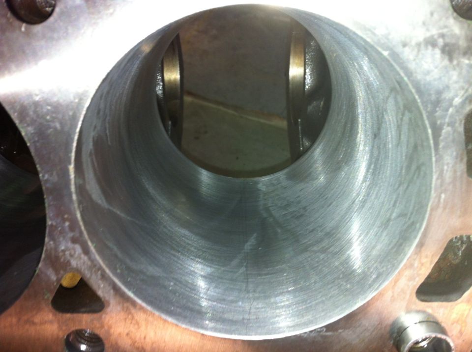 Close-up of an engine cylinder bore with visible honing marks