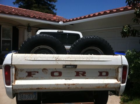 1977 Ford F-350 - The tailgate clearly spells out FORD, and the license plate is visible, but the truck's body style does not match a 1977 F-350.