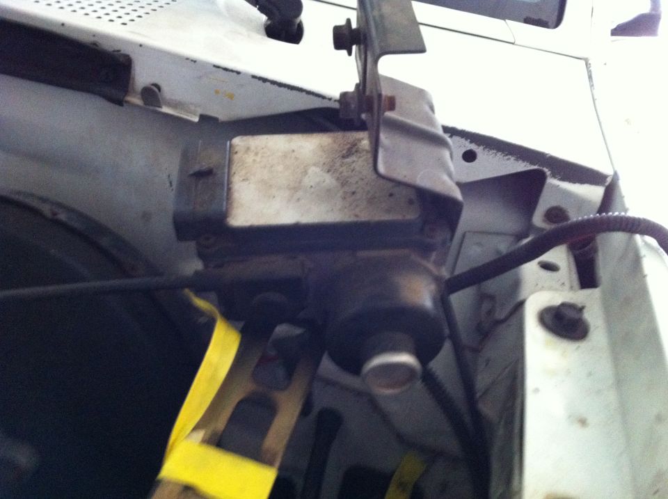 Engine component secured with yellow straps