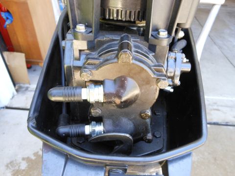1996 Ford F-150 - Close-up view of an outboard motor's internal engine components, including spark plugs and gears.