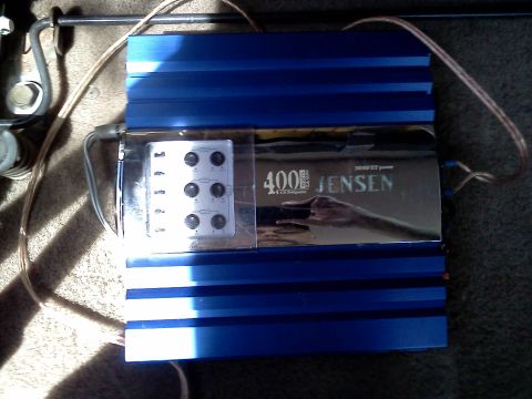 1995 Ford Bronco - Jensen 400W car amplifier with adjustable settings shown.