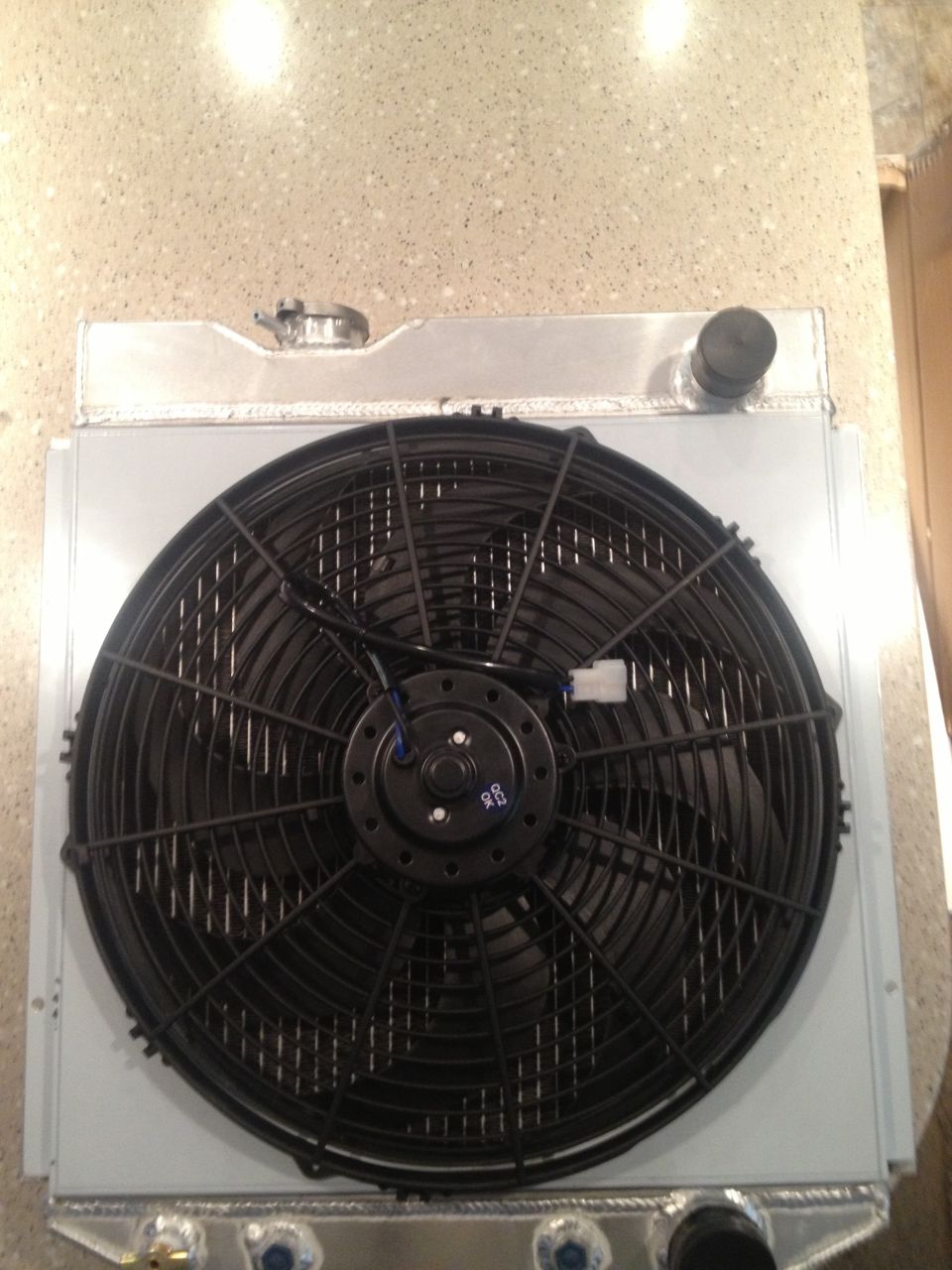 65 Mustang-Champion 2 row radiator, shroud, and electric fan.