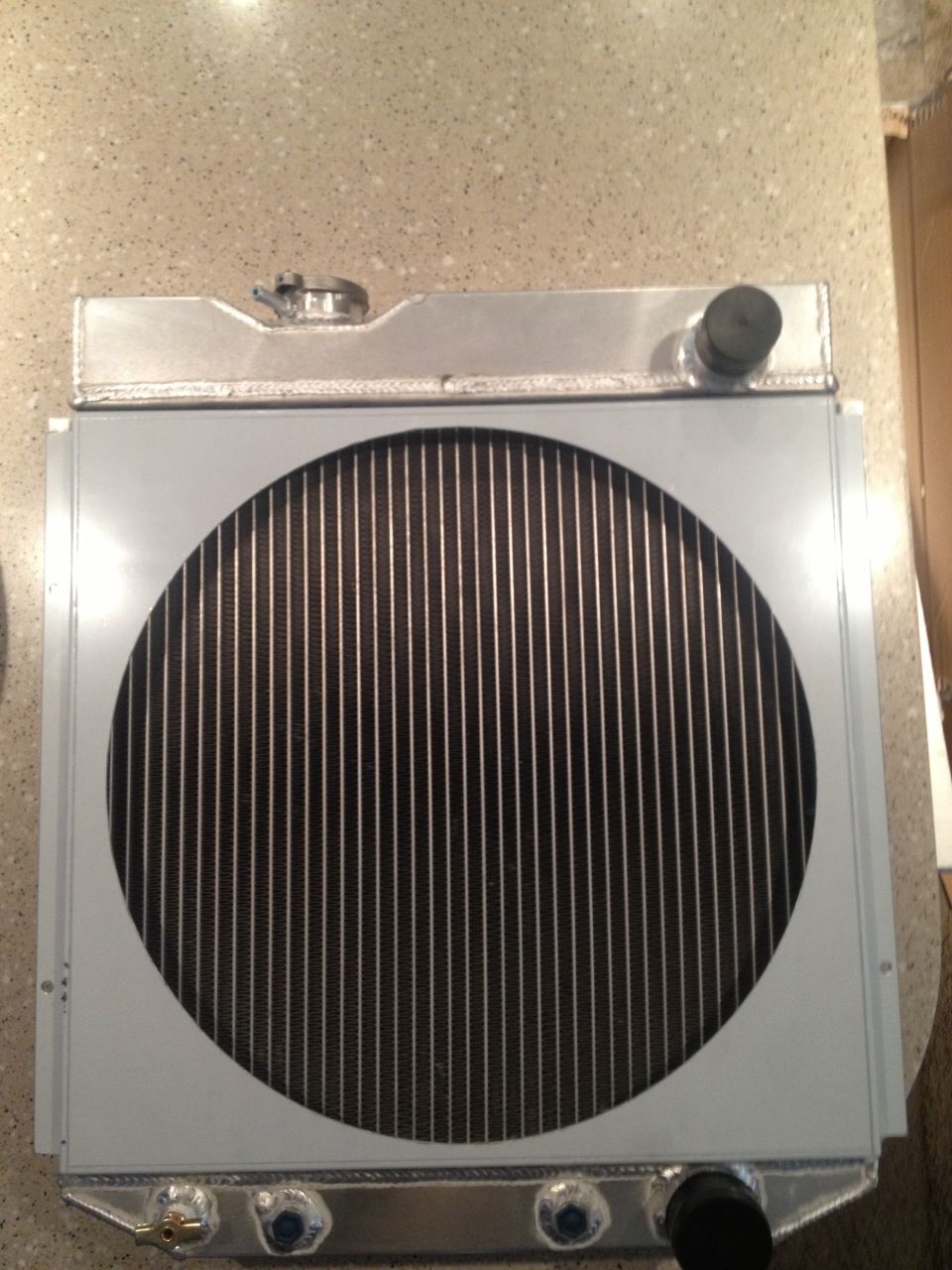 65 Mustang-Champion 2 row radiator, shroud, and electric fan.