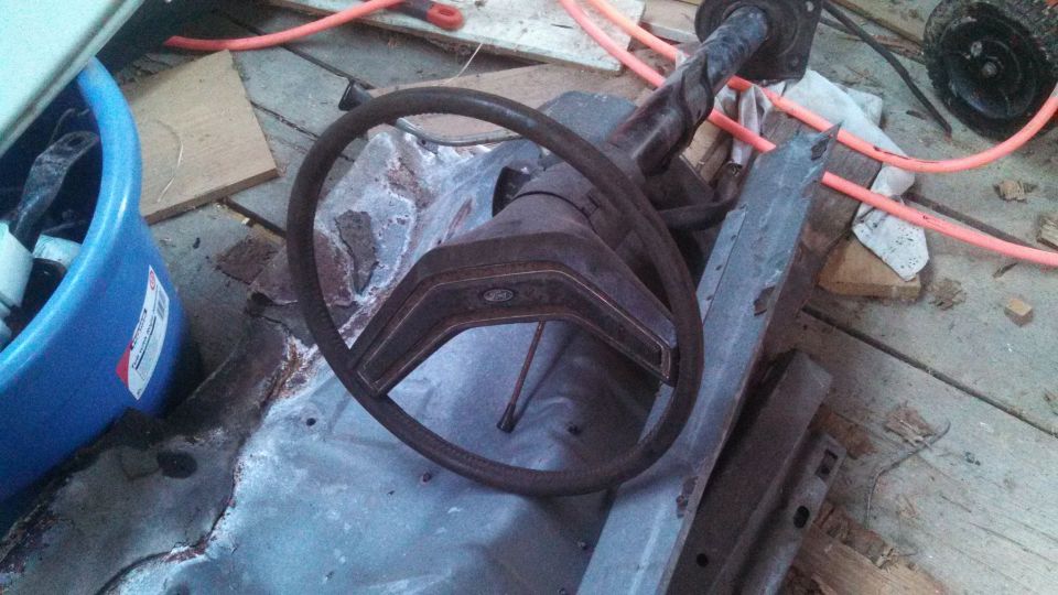 Ford steering wheel and column assembly, appears to be from a 1970s Ford truck or SUV