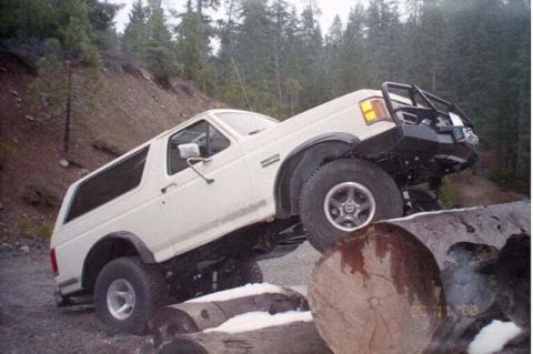 1990 Ford Bronco - Climbing a log pile, just 'cause it was there!
