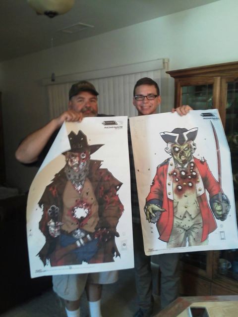1988 Ford Bronco - Two men proudly display their zombie-themed shooting targets.