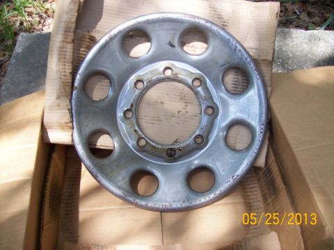 1982 Ford F-100 - A single wheel rim is shown, not a complete vehicle, making the 1982 Ford F-100 claim unverified.