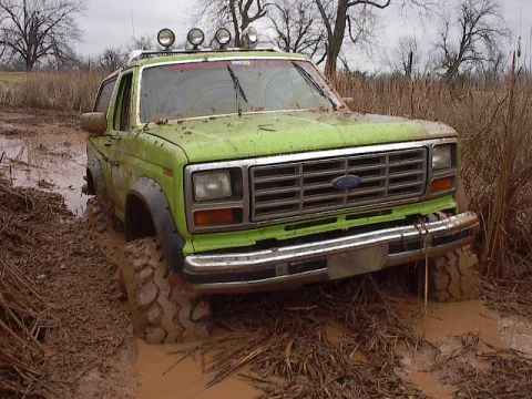1986 Ford Bronco - First stuck on 44's (and only one so far). Rear axle is completely under.