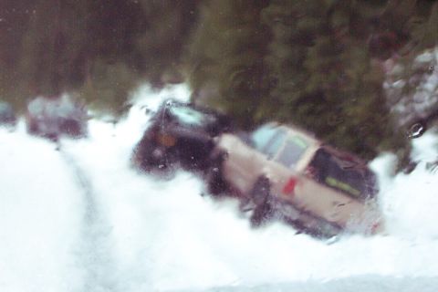 1996 Ford Bronco - So here we sit in the pouring rain while Steve takes Jim back to town for the spare gear box. (12/13/2003)