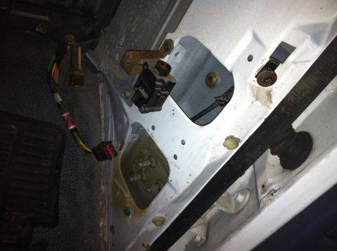 1992 Ford Bronco - Close-up view of a vehicle's wiring harness and electrical connectors, likely part of a wiring swap.
