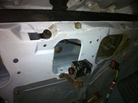 1992 Ford Bronco - Close-up view of the interior door panel with electrical components and wiring harness visible.