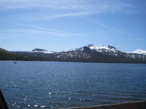 1989 Ford Bronco - A wide shot of a lake with mountains in the distance.