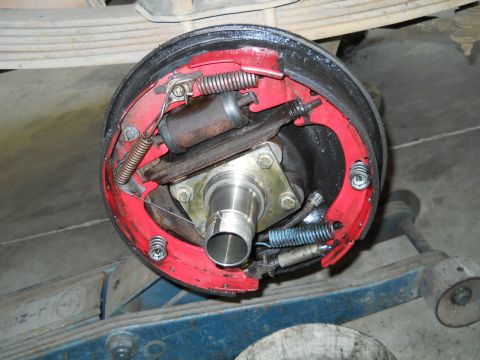 1992 Ford Bronco - Close-up of a vehicle's drum brake assembly, including the hub and brake shoes.
